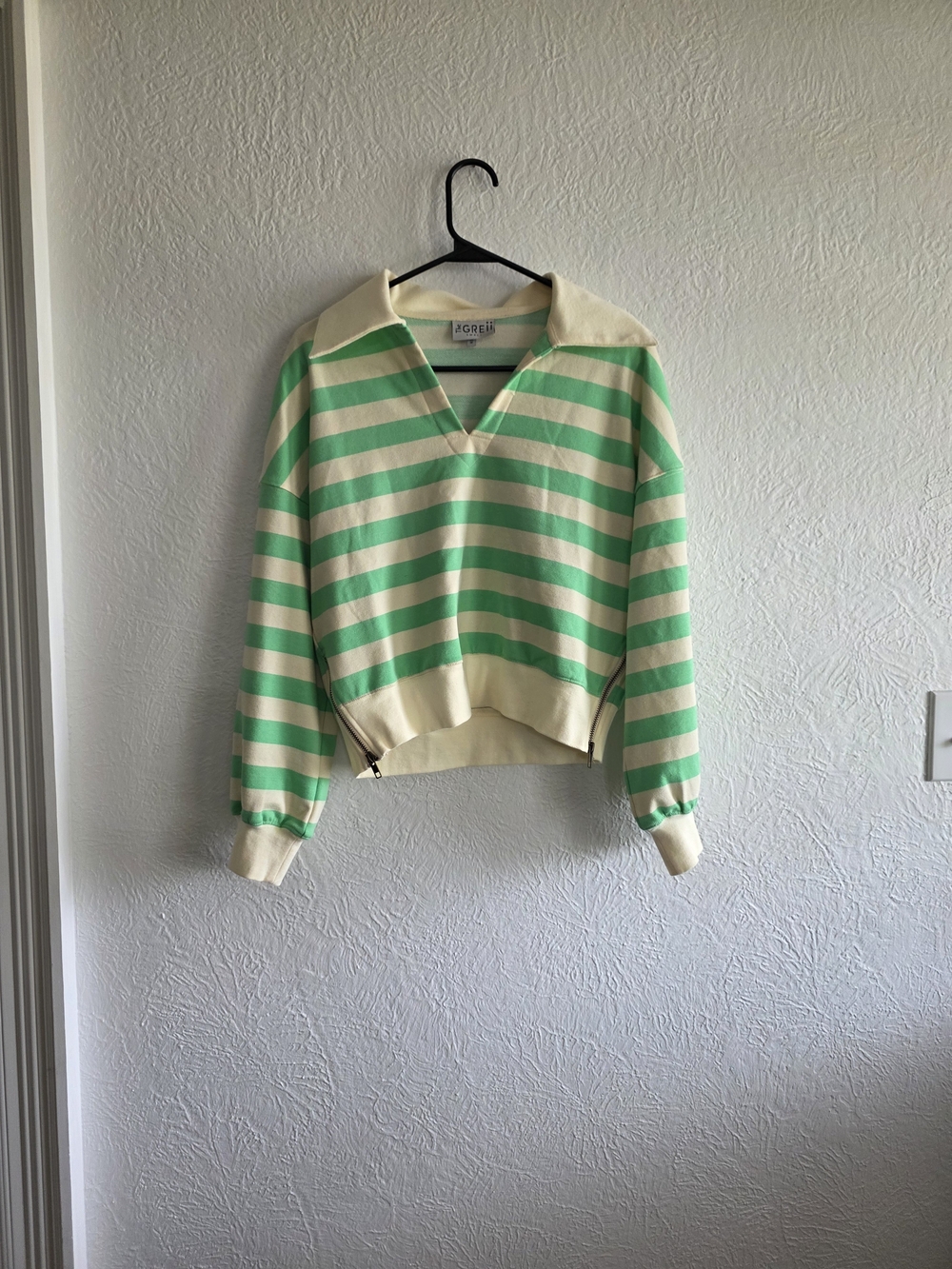 The Greii Striped V-Neck Polo Sweater in Green and Cream
